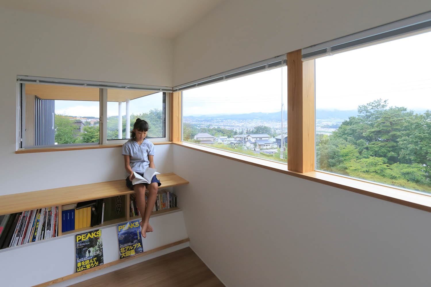 眼下に広がる街並みと、本の世界に思いを馳せる。